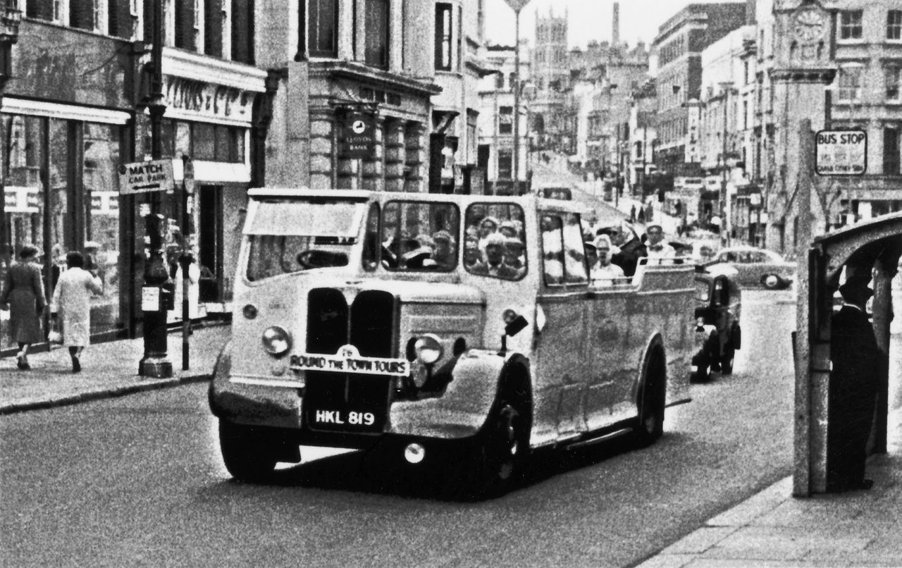 File:Round-the-town-tour-bus-at-Wellington-Place.-1963..jpg